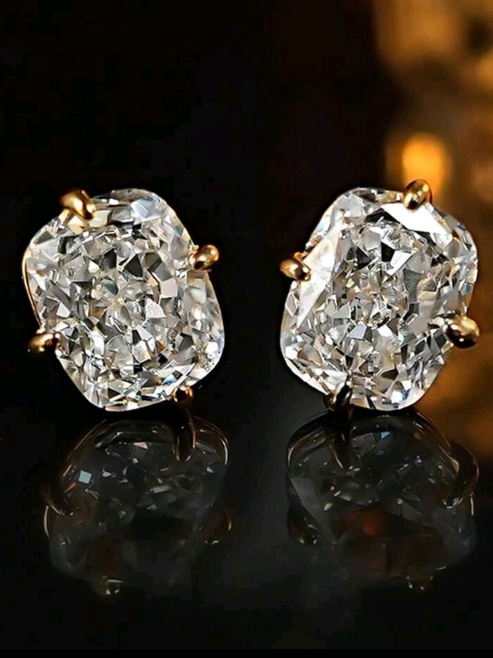 8 ctw Cushion Cut Simulated Diamond Studs Set in Yellow Gold Prongs